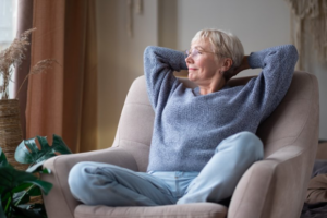 Woman relaxing in a cozy chair